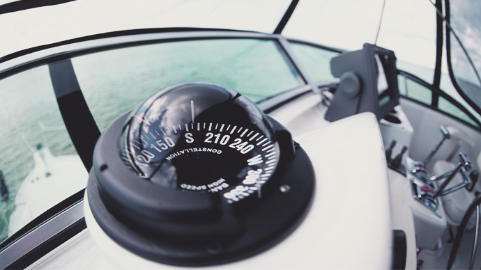 Compass on yacht helm