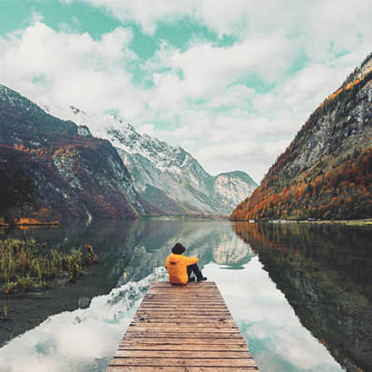 Holistic advice and wraparound services man sitting on a dock
